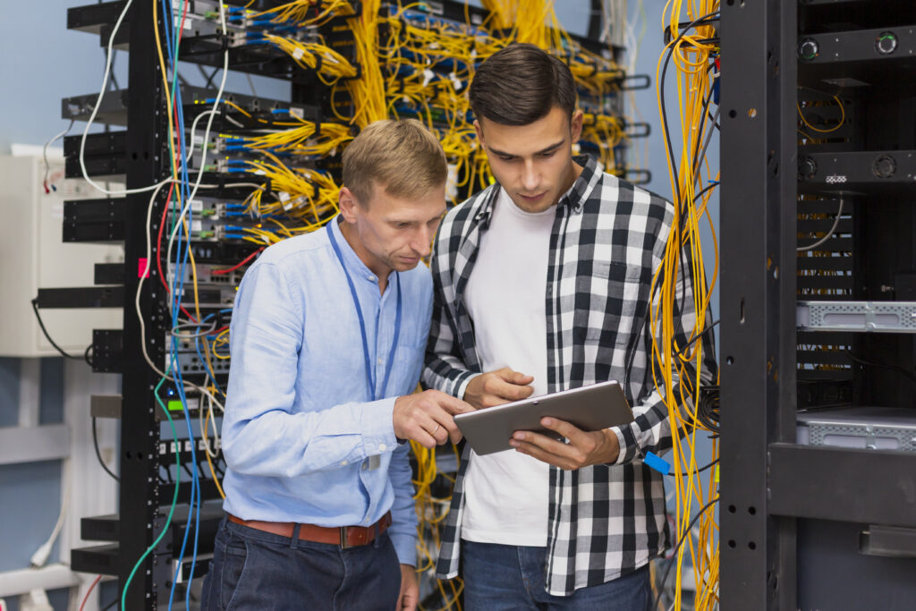 network-engineers-with-tablet-medium-shot